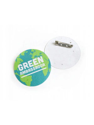 Circular badge made from recycled paper embedded with wildflower seeds and branded with your details. 